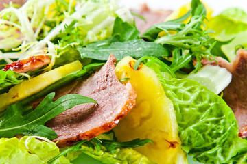 salad with  pineapple and smoked meat