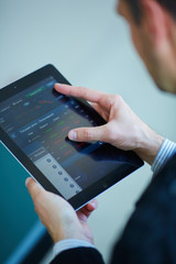 men holding digital tablet