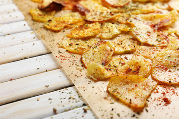 Homemade potato chips close up