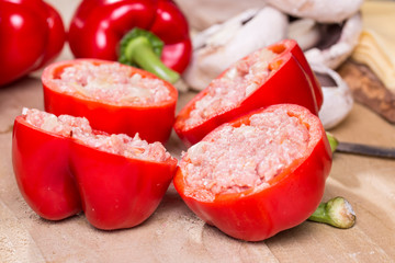 Stuffed red pepper with meat mushrooms and onion