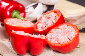 Stuffed red pepper with meat mushrooms and onion