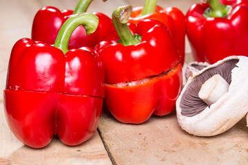 Stuffed red pepper with meat mushrooms and onion