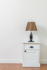 Lamp on bedside table