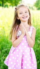 Portrait of adorable happy little girl