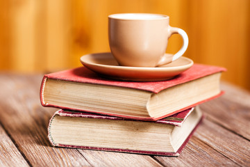 Books and a coffee cup
