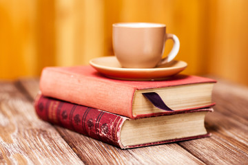 Naklejka premium Books and a coffee cup