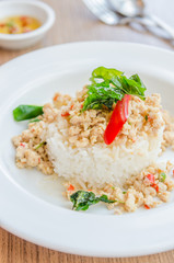 Spicy fried chicken with basil and rice