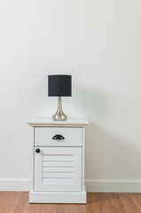 Lamp on bedside table