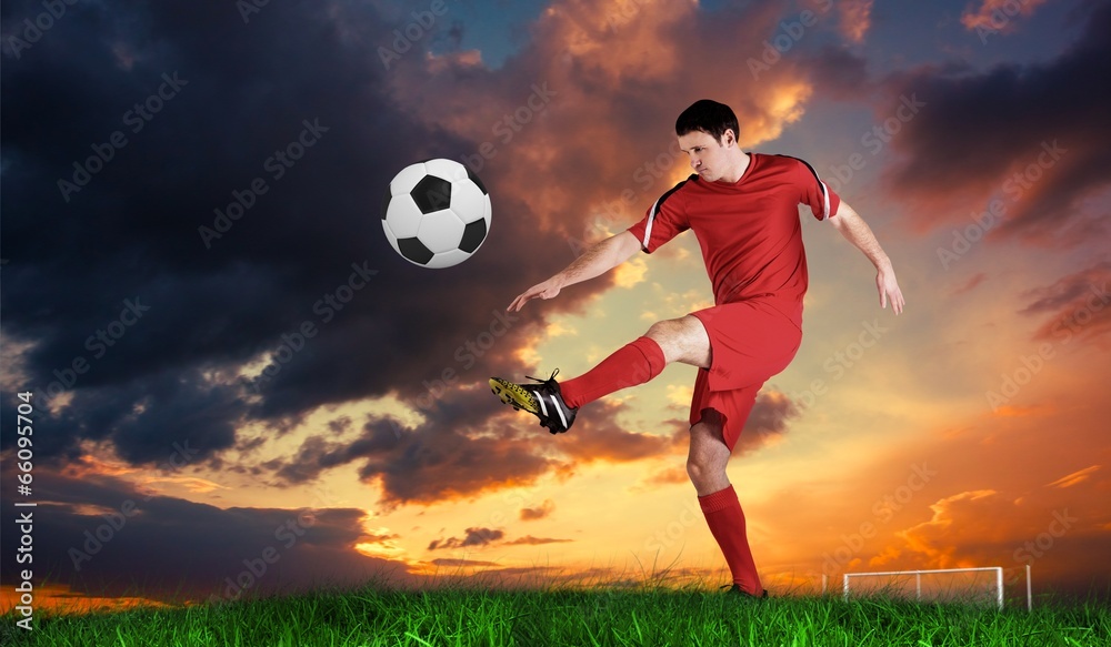 Poster composite image of football player in red kicking
