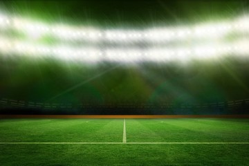 Football pitch under green lights