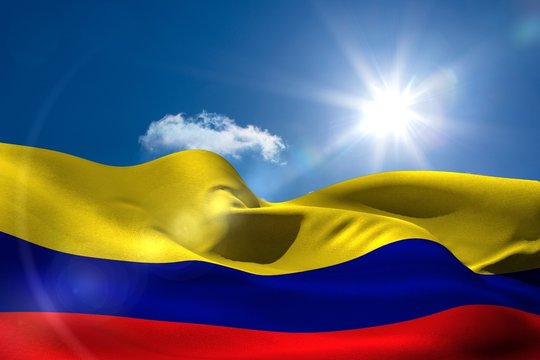 Colombia national flag under sunny sky - Powered by Adobe