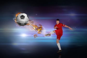 Plakat Composite image of football player in red kicking