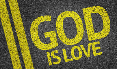 God Is Love written on the road - obrazy, fototapety, plakaty