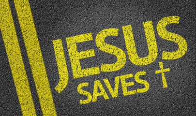 Jesus Saves written on the road - obrazy, fototapety, plakaty