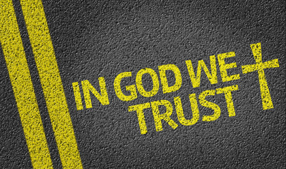In God We Trust written on the road - obrazy, fototapety, plakaty