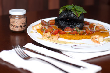 congrio fritto in pastella al nero di seppia