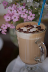 Cup of coffee and spring flowers
