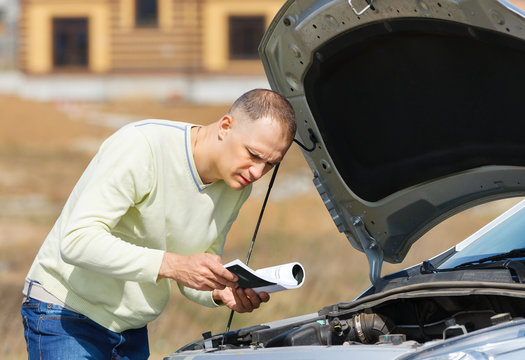 man and car