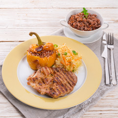 Steak with rice stuffed peppers