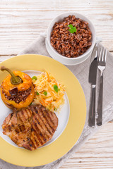 Steak with rice stuffed peppers