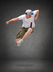 Fototapeta na wymiar male dancer jumping in the air