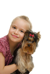 Young girl with cute Yorkshire terrier - best friends