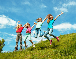 Fototapeta na wymiar Happy active children jumping