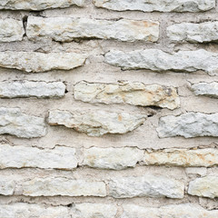 Old limestone brick wall fragment