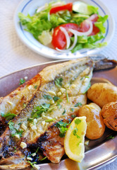 grilled seabass cooked with potatoes