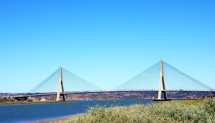 Fototapeta na wymiar International Bridge on Guadiana River in Ayamonte