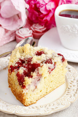 Piece of strawberry cake on ceramic plate