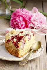 Piece of strawberry cake on ceramic plate