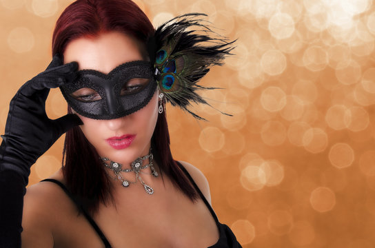 Beautiful woman in carnival mask.