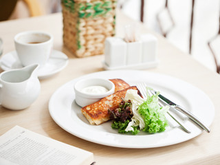 Crepes stuffed with cream and vegetables