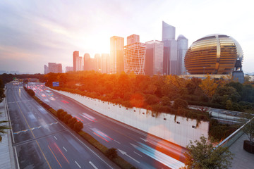 Fototapeta premium modern city with sunset