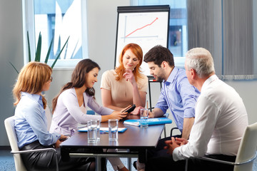 Business people discussing at meeting