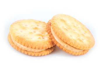 Peanut butter cream and biscuit in white background