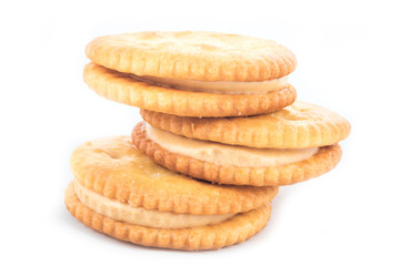 Peanut butter cream and biscuit in white background