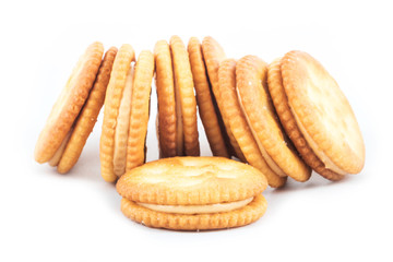 Peanut butter cream and biscuit in white background