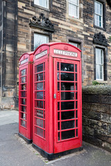 Classic red British telephone box in Edinburgh
