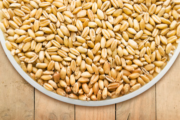 Wheat on wooden floor