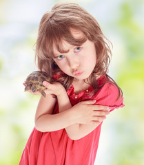 Little girl with a turtle