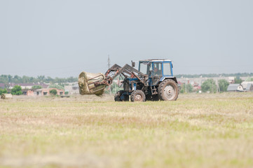 Mechanized harvesting of grass on the flood-plain meadow