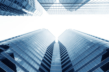 Fototapeta na wymiar Modern glass silhouettes of skyscrapers in the city