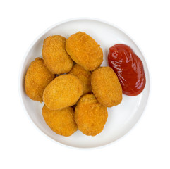 Serving of chicken nuggets with ketchup