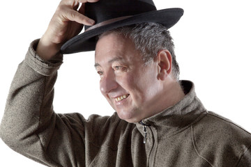Fototapeta premium Man lifts hat in greeting