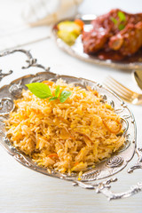 biryani rice with chicken on background