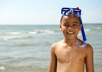 Little boy smiling with snorkel