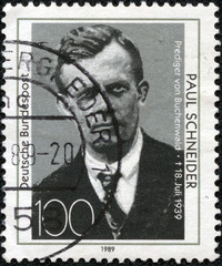 stamp printed in Germany shows image of Paul Schneider