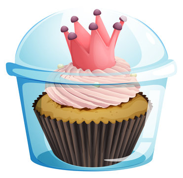 A cupcake with a crown inside the disposable container